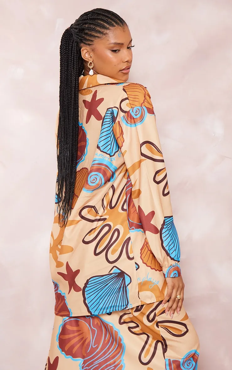 Chemise de plage en effet lin beige imprimé coquillages à boutons
