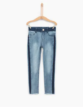 Jean skinny faded blue 7/8ème bas frangés fille